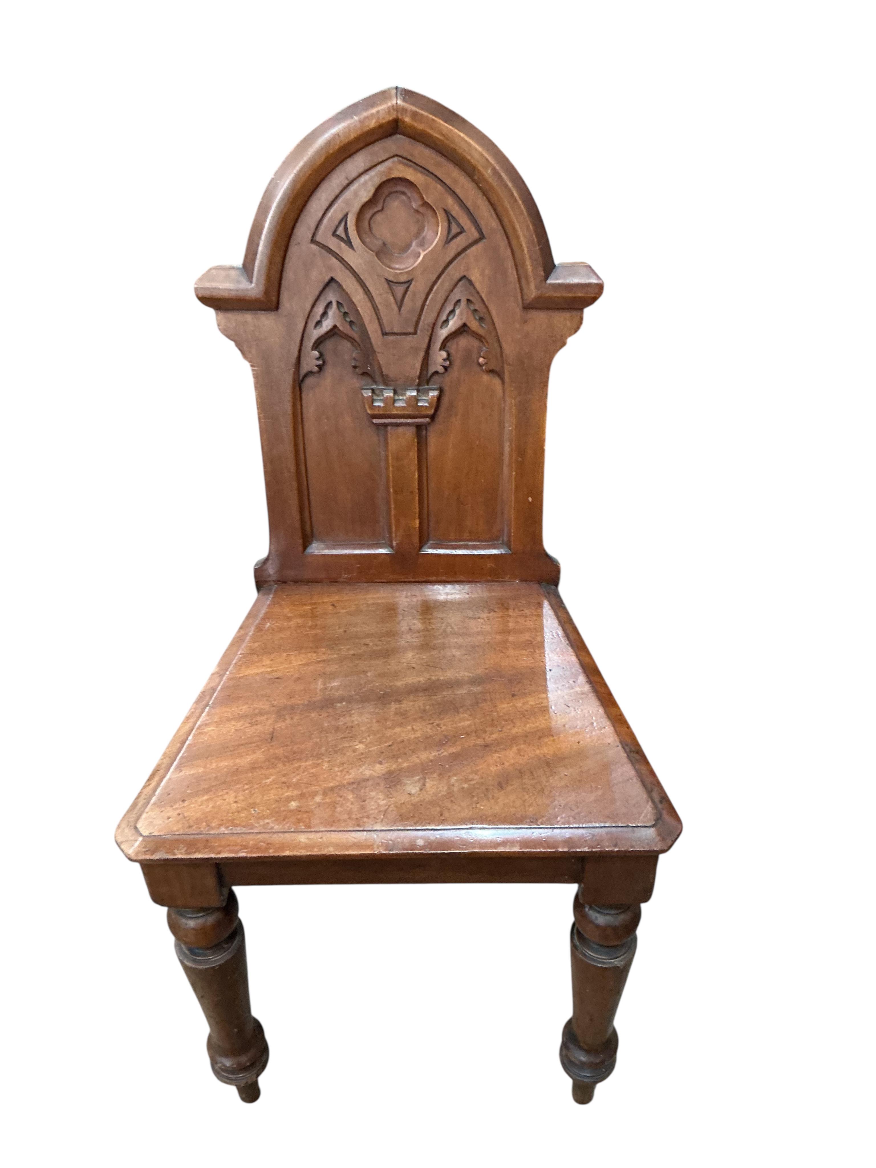 Three (two plus one) Victorian mahogany hall chairs